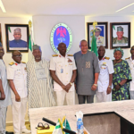 NAF President Nnamdi Chamberlain Dunkwu and Nigerian Navy officers during a courtesy visit at Naval Headquarters in Abuja.
