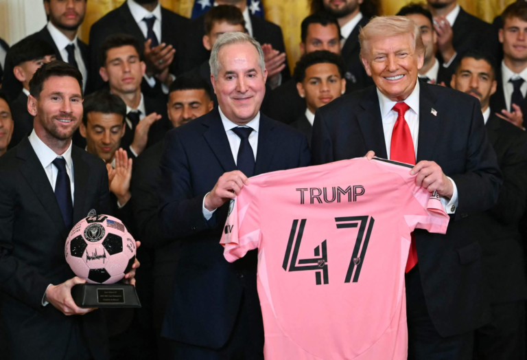 Lionel Messi and Inter Miami players standing with US President Donald Trump during a White House ceremony celebrating their 2025 MLS Cup triumph.